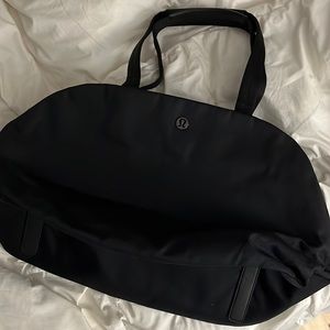 Black lululemon “go getter bag”.  25L
